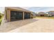 Large backyard patio with screened enclosure at 6206 Windship Ct, Tampa, FL 33647