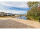 Spacious backyard with patio overlooking a lake at 6206 Windship Ct, Tampa, FL 33647