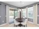 Dining area with a round table and chairs, near sliding glass doors at 6206 Windship Ct, Tampa, FL 33647