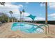 Inviting community pool with ample lounge chairs at 6330 Watercrest Way # 404, Bradenton, FL 34202