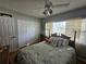 Charming bedroom with a queen-size bed and large closet at 7711 Innis Ct, St Petersburg, FL 33709