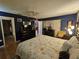 Spacious bedroom with king-size bed and access to bathroom at 7711 Innis Ct, St Petersburg, FL 33709