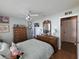 Bright bedroom with double closets and ceiling fan at 7711 Innis Ct, St Petersburg, FL 33709