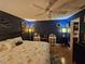 Spacious bedroom with king-size bed and en-suite bathroom access at 7711 Innis Ct, St Petersburg, FL 33709