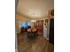 Dining room with hardwood floors, oval table and china cabinet at 7711 Innis Ct, St Petersburg, FL 33709
