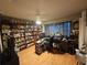 Home office with built-in bookcases and workspace at 7711 Innis Ct, St Petersburg, FL 33709