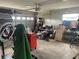 A cluttered garage with various tools and materials at 8719 Elmwood Ln, Tampa, FL 33615