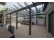 Outdoor grilling station with pergola and patio furniture at 1010 Central Ave # 106, St Petersburg, FL 33705