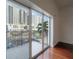 Residential balcony overlooks city street and modern buildings at 1010 Central Ave # 106, St Petersburg, FL 33705