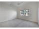 Bright bedroom with ceiling fan and carpet flooring at 1010 Central Ave # 106, St Petersburg, FL 33705