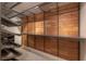 Large walk-in closet with wood paneling and shelving at 1010 Central Ave # 106, St Petersburg, FL 33705