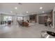 Community room boasts comfortable seating, large TV, and dining area at 1010 Central Ave # 106, St Petersburg, FL 33705