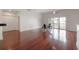 Hardwood floor dining area with glass table and chairs at 1010 Central Ave # 106, St Petersburg, FL 33705