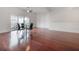 Dining area with hardwood floors and glass table at 1010 Central Ave # 106, St Petersburg, FL 33705