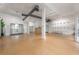 Open and bright retail space with hardwood floors and shelving at 1010 Central Ave # 106, St Petersburg, FL 33705