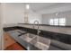 Double stainless steel sink with modern faucet at 1010 Central Ave # 106, St Petersburg, FL 33705