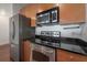 Modern kitchen with stainless steel appliances at 1010 Central Ave # 106, St Petersburg, FL 33705