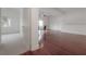 Open living area with hardwood floors and dining area at 1010 Central Ave # 106, St Petersburg, FL 33705