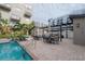 Outdoor kitchen and dining area near the pool at 1010 Central Ave # 106, St Petersburg, FL 33705