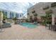 Resort-style pool with lounge chairs and a surrounding patio at 1010 Central Ave # 106, St Petersburg, FL 33705