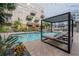 Resort-style pool with lounge chairs and a relaxing daybed at 1010 Central Ave # 106, St Petersburg, FL 33705