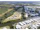 Aerial view of waterfront community with RV park and mobile homes at 112 Saint Pierres Way, Apollo Beach, FL 33572
