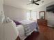 Main bedroom with hardwood floors and neutral color scheme at 112 Saint Pierres Way, Apollo Beach, FL 33572
