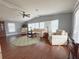 Bright and airy living room, hardwood floors, neutral colors at 112 Saint Pierres Way, Apollo Beach, FL 33572