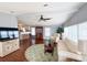 Spacious living room with hardwood floors and lots of natural light at 112 Saint Pierres Way, Apollo Beach, FL 33572