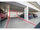 Reserved parking spot in a garage with additional storage at 11730 Shipwatch Dr # 702, Largo, FL 33774