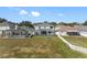 Aerial view of two homes with pools and fenced backyards at 1312 Brooke View Dr, Odessa, FL 33556