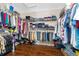 Large walk-in closet with ample hanging and shelf space at 1312 Brooke View Dr, Odessa, FL 33556