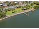 Aerial view of waterfront park with walking paths and pier at 17960 Gulf Blvd # 103, Redington Shores, FL 33708