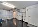Organized garage with built-in cabinets and storage at 17960 Gulf Blvd # 103, Redington Shores, FL 33708