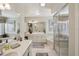 Large bathroom with a soaking tub and double vanity at 1928 E View Dr, Sun City Center, FL 33573