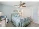 Cozy bedroom with a comfortable bed and built-in closet at 1928 E View Dr, Sun City Center, FL 33573