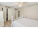 Light and airy bedroom with a white bed and spacious closet at 1928 E View Dr, Sun City Center, FL 33573
