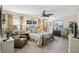 Bright bedroom featuring a comfortable bed and plenty of natural light at 1928 E View Dr, Sun City Center, FL 33573