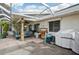 Outdoor patio with seating area and grill at 1928 E View Dr, Sun City Center, FL 33573
