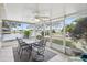 Spacious screened patio overlooking a serene lake at 1928 E View Dr, Sun City Center, FL 33573