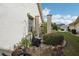 Landscaped side yard with garden and storage at 1928 E View Dr, Sun City Center, FL 33573