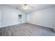 Main bedroom with ensuite bathroom and vinyl flooring at 2044 Heartland Cir, Valrico, FL 33594