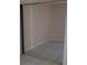 Mirrored sliding doors in a spacious bedroom closet at 209 Ne Lincoln N Cir # 109, St Petersburg, FL 33702