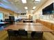 Community art studio with large tables, chairs, and a TV for residents to enjoy arts and crafts at 2116 Nantucket Dr # 19, Sun City Center, FL 33573