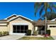 Front view of charming villa with carport and landscaped yard at 2116 Nantucket Dr # 19, Sun City Center, FL 33573