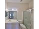 Bathroom featuring a vanity, toilet and shower stall at 2405 New Haven Cir, Sun City Center, FL 33573