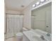 Clean bathroom with shower/tub combo and updated vanity at 2405 New Haven Cir, Sun City Center, FL 33573