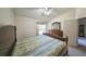 Comfortable bedroom with a double bed and built-in wardrobe at 2405 New Haven Cir, Sun City Center, FL 33573