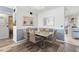 Beautiful dining room features modern table, seating, and decor at 2468 Florentine Way # 52, Clearwater, FL 33763