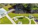 Picturesque pond with dock and fountain, surrounded by lush landscaping and walking paths at 2468 Florentine Way # 52, Clearwater, FL 33763